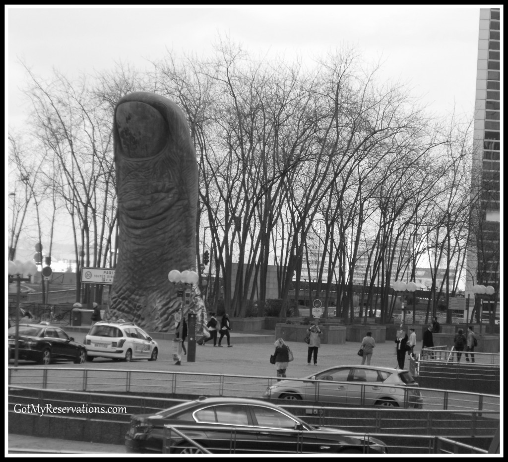 GotMyReservations - Le Pouce Thumb Sculpture in Paris